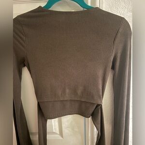 Olive green ribbed tie in the back shirt